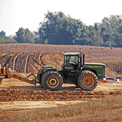 Boone Ridge Townhomes Dirt Grading with Tractor Mitch Cox Companies